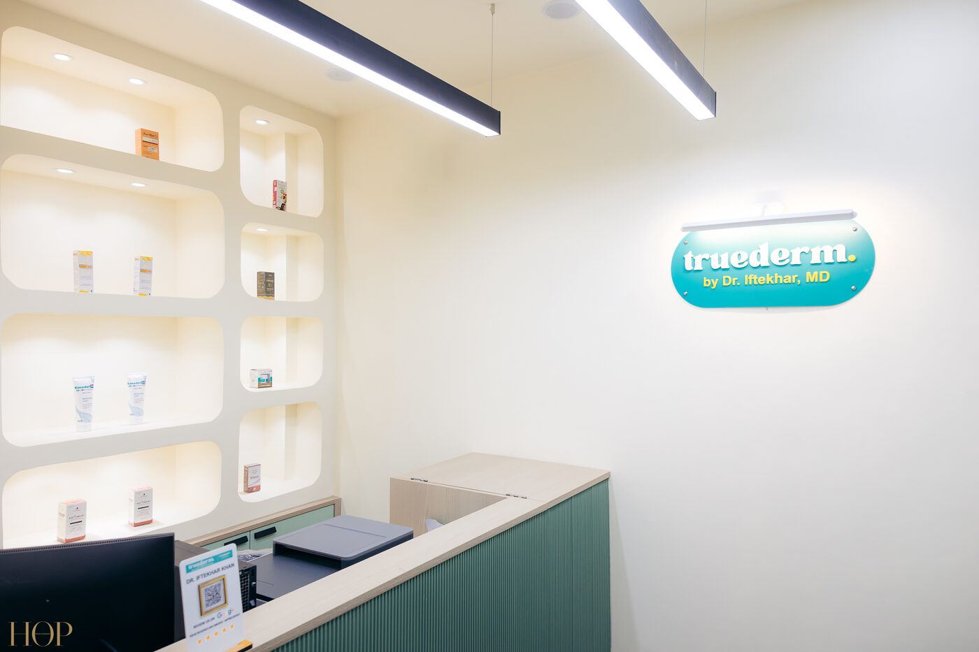 TrueDerm reception desk with signage