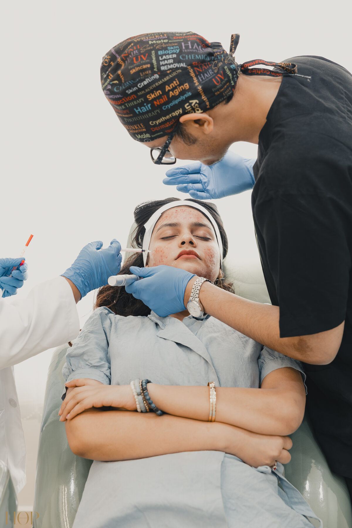 Dr. Iftekhar Khan performing a skin treatment at TrueDerm